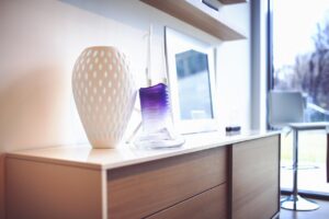 Wybór idealnej komody do Twojego wnętrza: styl, funkcjonalność i inspiracje
